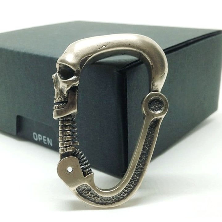 Novel Skull Carabiner with Articulated Cervical Column Clasp